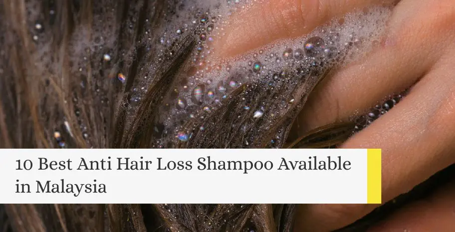 Close-up of hands washing sudsy hair with text: 10 Best Anti Hair Loss Shampoo Available in Malaysia.