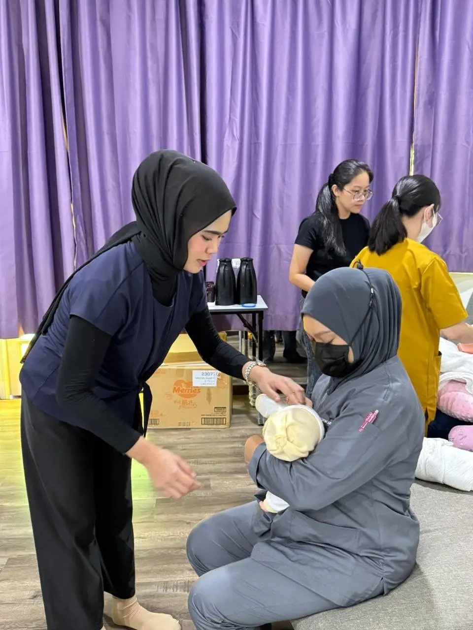 Dee attending lactation consultant training with Latch Lab Malaysia.